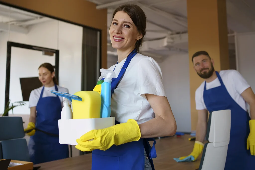 Professional Cleaner Holding Supplies